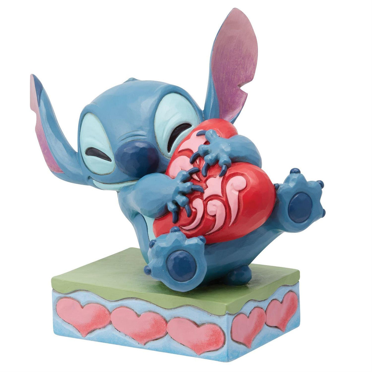 Disney Traditions Stitch Hugging Heart Figurine