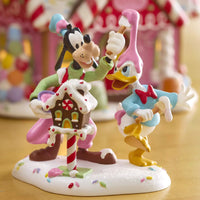 Department 56 Village Disney Showcase - Goofy & Donald Duck Make A Mess Figurine 6013665