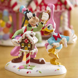Department 56 Village Disney Showcase - Goofy & Donald Duck Make A Mess Figurine 6013665