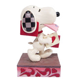 Jim Shore x Peanuts - Snoopy Holding Valentine Figurine 6010112